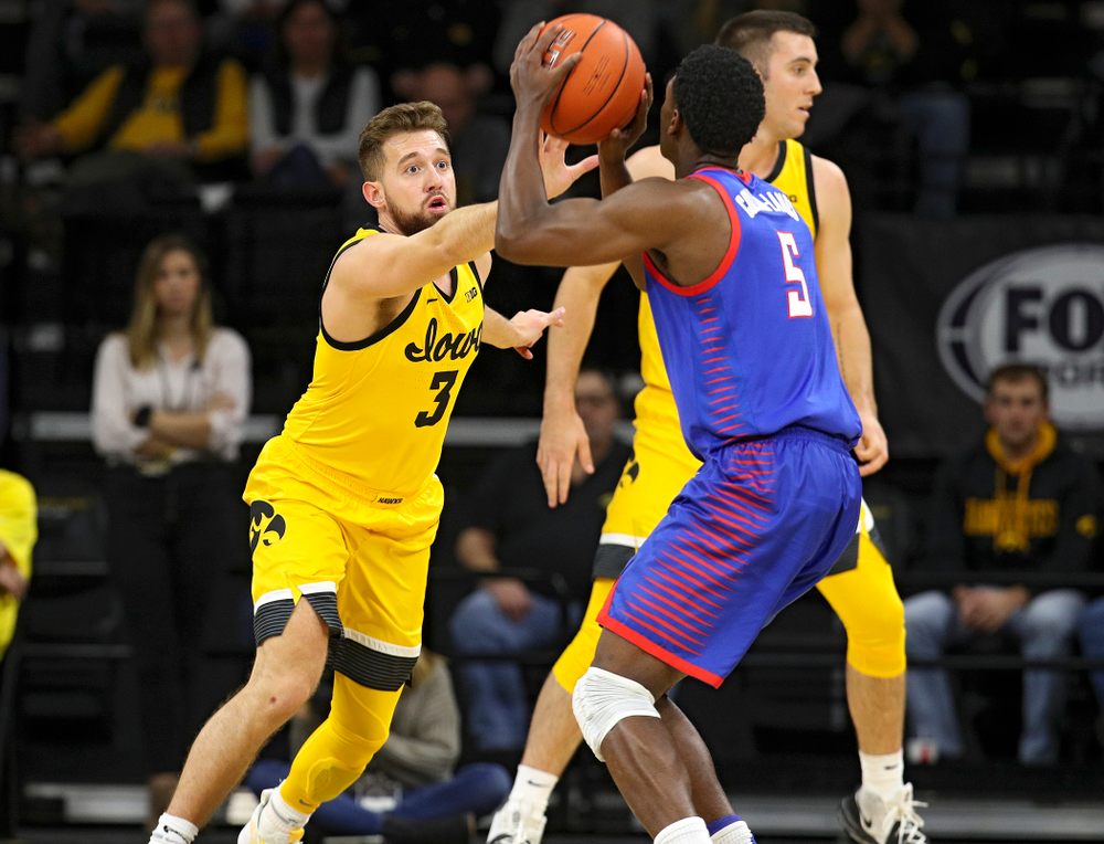 Iowa Hawkeyes guard Jordan Bohannon (3) defends during the first half of their game at Carver-Hawkeye Arena in Iowa City on Monday, Nov 11, 2019. (Stephen Mally/hawkeyesports.com)