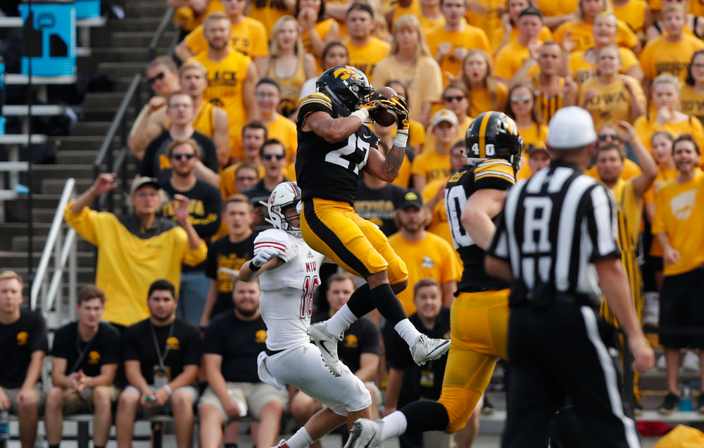 Iowa Hawkeyes defensive back Amani Hooker (27) interceptss a pass against the Northern Illinois Huskies Saturday, September 1, 2018 at Kinnick Stadium. (Brian Ray/hawkeyesports.com)