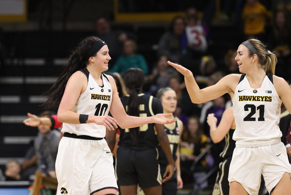 Iowa Hawkeyes forward Megan Gustafson (10) and forward Hannah Stewart (21) against the Purdue Boilermakers Sunday, January 27, 2019 at Carver-Hawkeye Arena. (Brian Ray/hawkeyesports.com)