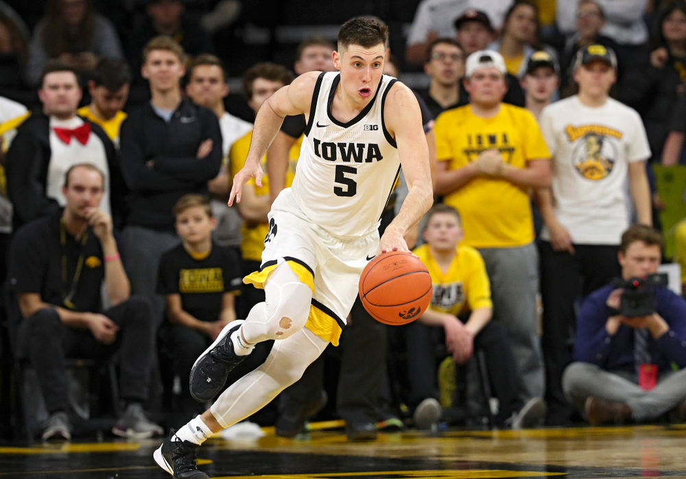 Iowa Hawkeyes guard CJ Fredrick (5) pushes the ball down the court during the second half of their game at Carver-Hawkeye Arena in Iowa City on Friday, Nov 8, 2019. (Stephen Mally/hawkeyesports.com)