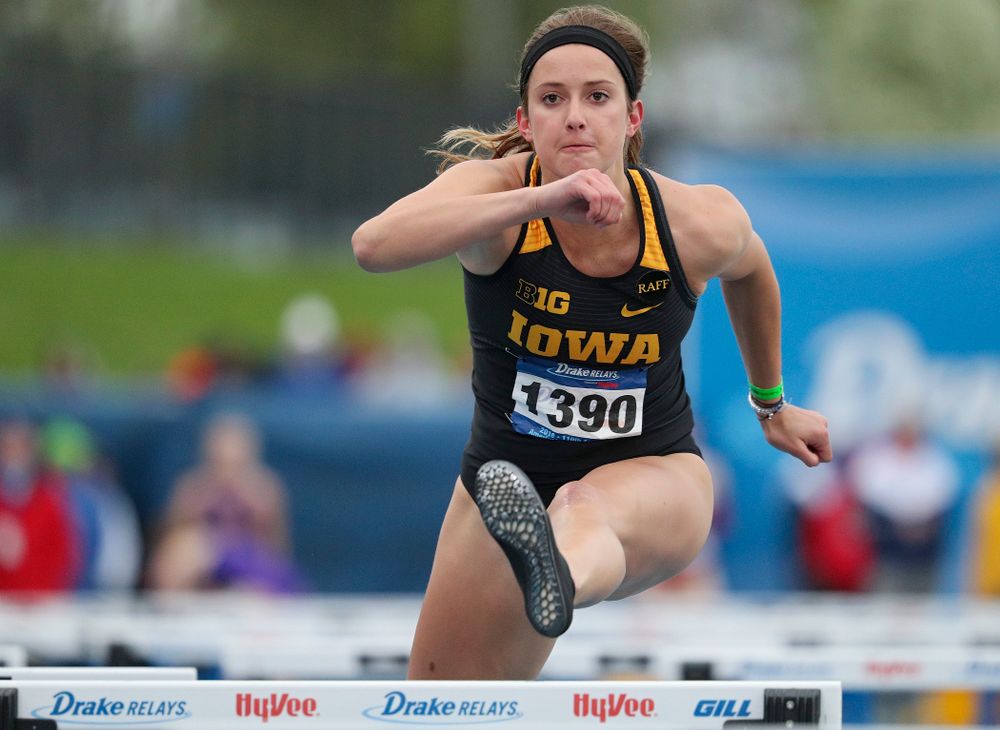 Iowa's Carly Donahue runs the women's shuttle hurdles event during the third day of the Drake Relays at Drake Stadium in Des Moines on Saturday, Apr. 27, 2019. (Stephen Mally/hawkeyesports.com)