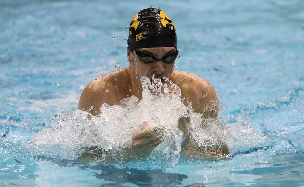 Iowa's Weston Credit competes in the 200-yard breaststroke during a meet against Michigan and Denver at the Campus Recreation and Wellness Center on November 3, 2018. (Tork Mason/hawkeyesports.com)