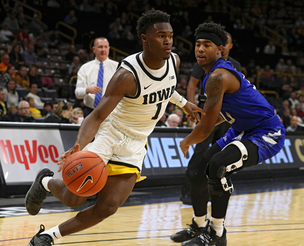 Iowa Hawkeyes guard Joe Toussaint (1) drives in with the ball during the first half of their exhibition game against Lindsey Wilson College at Carver-Hawkeye Arena in Iowa City on Monday, Nov 4, 2019. (Stephen Mally/hawkeyesports.com)