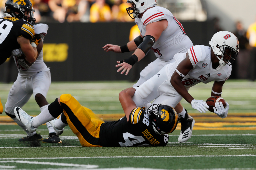 Iowa Hawkeyes linebacker Jack Hockaday (48) brings down Northern Illinois Huskies quarterback Rodney Hall (6) Saturday, September 1, 2018 at Kinnick Stadium. (Brian Ray/hawkeyesports.com)