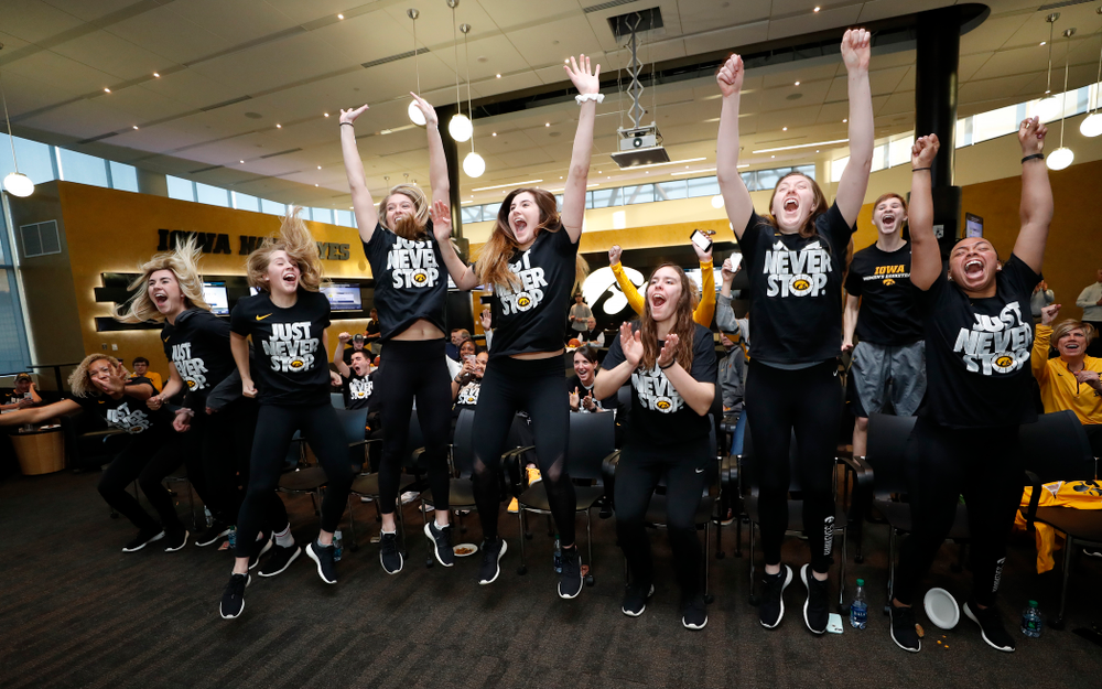 The Iowa Hawkeyes celebrate after finding out their seed in the 2018 NCAA Women's Basketball Tournament