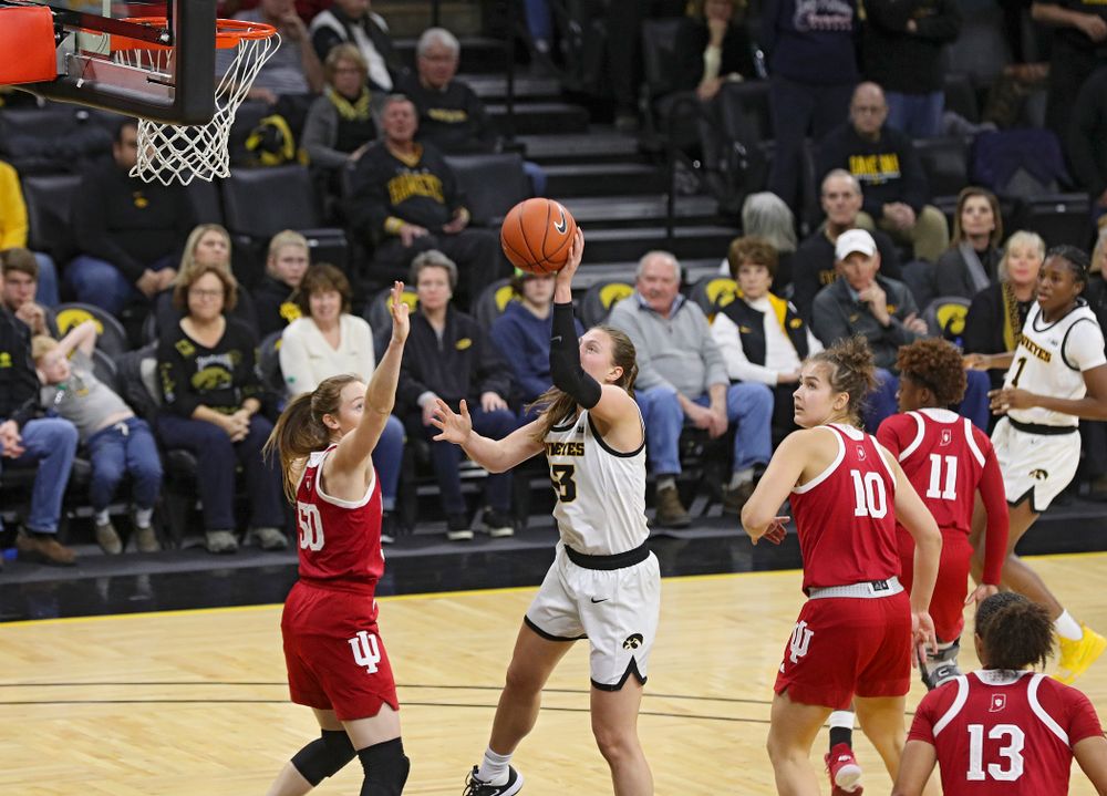 Iowa Hawkeyes forward Amanda Ollinger (43) makes a basket while being fouled during the third quarter of their game at Carver-Hawkeye Arena in Iowa City on Sunday, January 12, 2020. (Stephen Mally/hawkeyesports.com)
