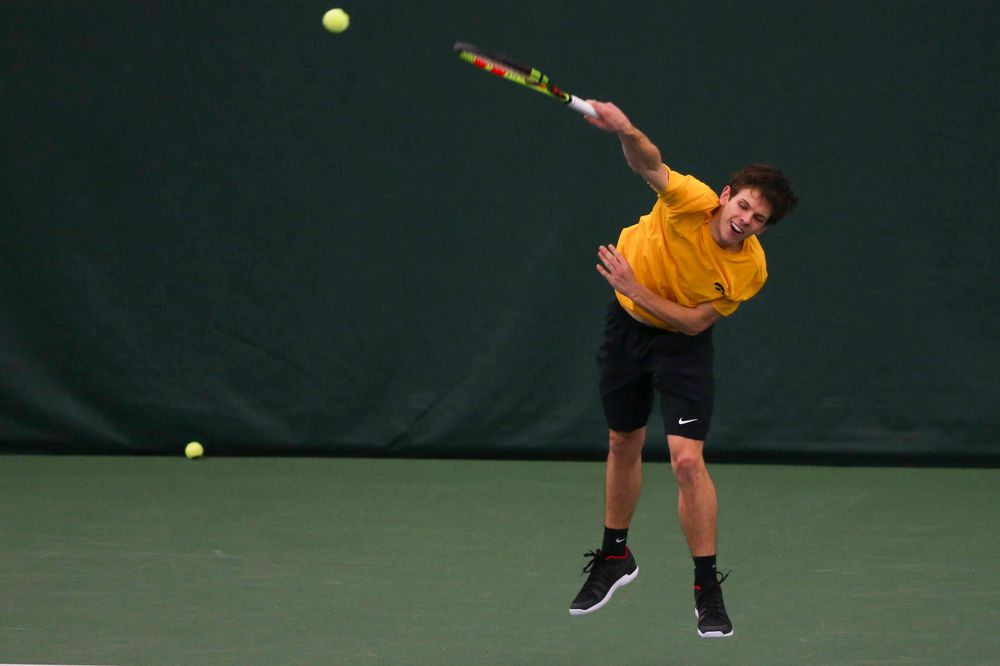 Iowa's Joe Tyler at a tennis match vs Drake Friday, March 8, 2019 at the Hawkeye Tennis and Recreation Complex. (Lily Smith/hawkeyesports.com)