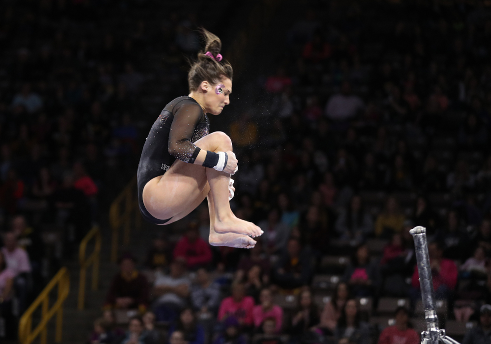 Iowa's Jax Krantz competes on the bars during their meet against the Minnesota Golden Gophers Saturday, January 19, 2019 at Carver-Hawkeye Arena. (Brian Ray/hawkeyesports.com)