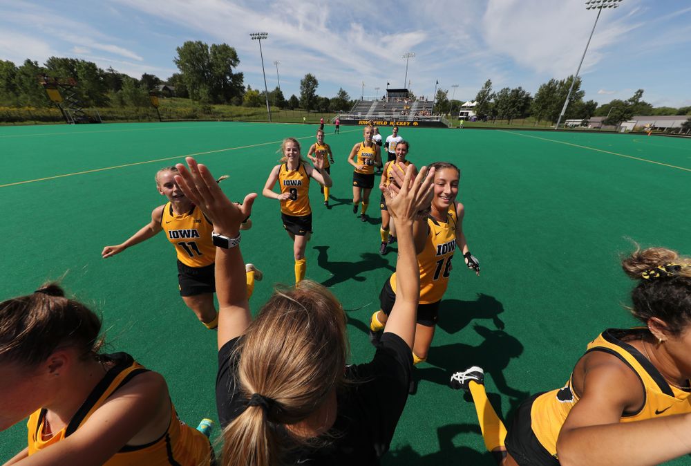 Iowa Hawkeyes Katie Birch (11), Isabella Solaroli (16), and Iowa Hawkeyes assistant coach Roz Ellis during an exhibition game against Northwestern Saturday, August 24, 2019 at Grant Field. (Brian Ray/hawkeyesports.com)