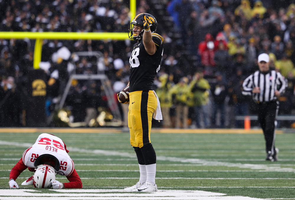 Iowa Hawkeyes tight end T.J. Hockenson (38) signals for a first down during a game against Nebraska at Kinnick Stadium on November 23, 2018. (Tork Mason/hawkeyesports.com)