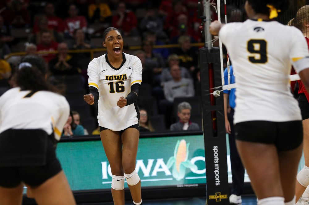 Iowa Hawkeyes outside hitter Taylor Louis (16) celebrates after winning a point during a match against Nebraska at Carver-Hawkeye Arena on November 7, 2018. (Tork Mason/hawkeyesports.com)