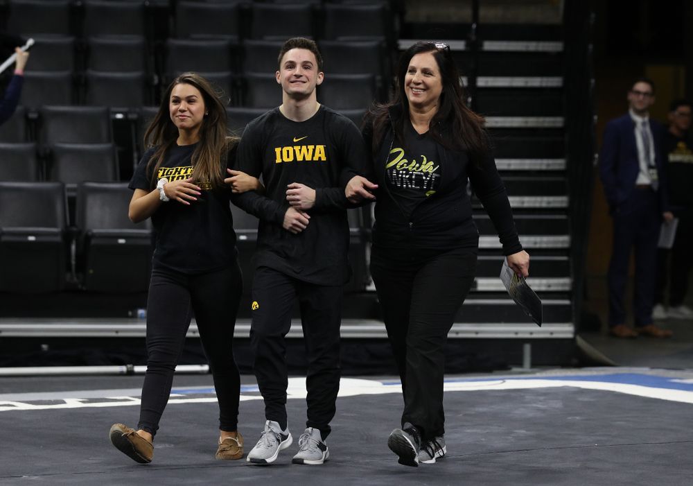 Iowa Men's Gymnast Jake Brodarzon and his family during senior day ceremonies following their meet against the Ohio State Buckeyes Saturday, March 16, 2019 at Carver-Hawkeye Arena. (Brian Ray/hawkeyesports.com)
