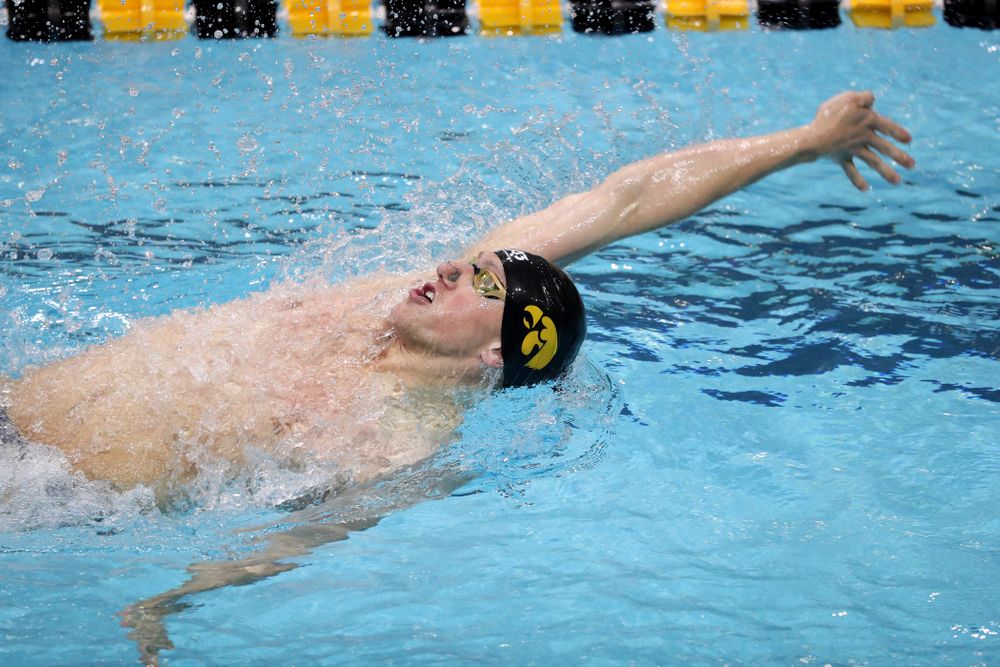 IowaÕs John Colin swims the backstroke leg of the 200 Medley Relay against Notre Dame and Illinois Saturday, January 11, 2020 at the Campus Recreation and Wellness Center. (Brian Ray/hawkeyesports.com)