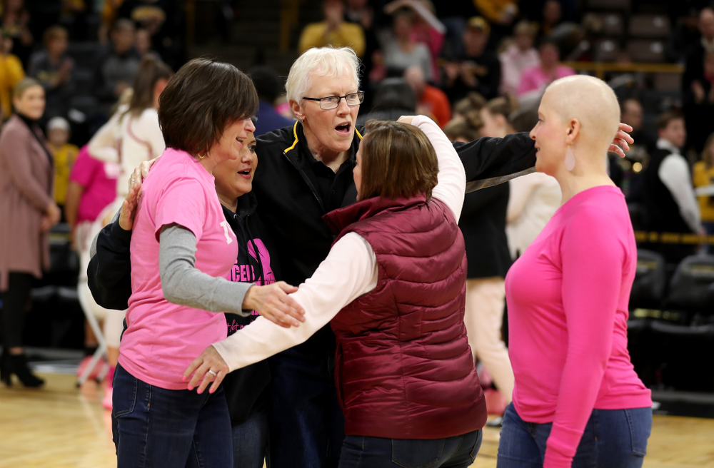 Women affected by cancer are introduced during the Iowa Hawkeyes game against the Wisconsin Badgers Sunday, February 16, 2020 at Carver-Hawkeye Arena. (Brian Ray/hawkeyesports.com)