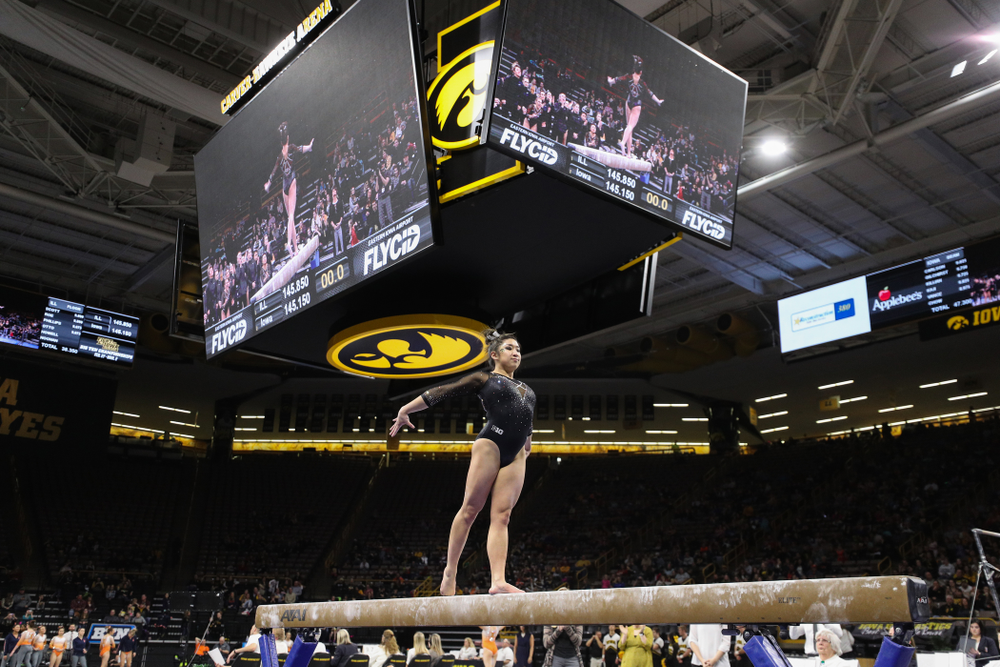 Iowa's Nicole Chow competes on the beem against Illinois Saturday, February 16, 2019 at Carver-Hawkeye Arena. (Brian Ray/hawkeyesports.com)