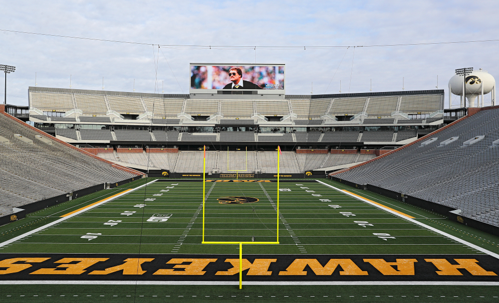 A picture of Hayden Fry is shown on the video boards at Kinnick Stadium in Iowa City on Wednesday, December 18, 2019. Hayden Fry passed away on Dec. 17, at the age of 90. (Stephen Mally/hawkeyesports.com)