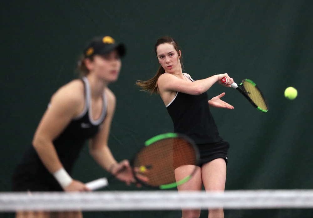 Iowa's Samantha Mannix and Elise Van Heuvelen Treadwell play a doubles match against the Penn State Nittany Lions Sunday, February 24, 2019 at the Hawkeye Tennis and Recreation Complex. (Brian Ray/hawkeyesports.com)