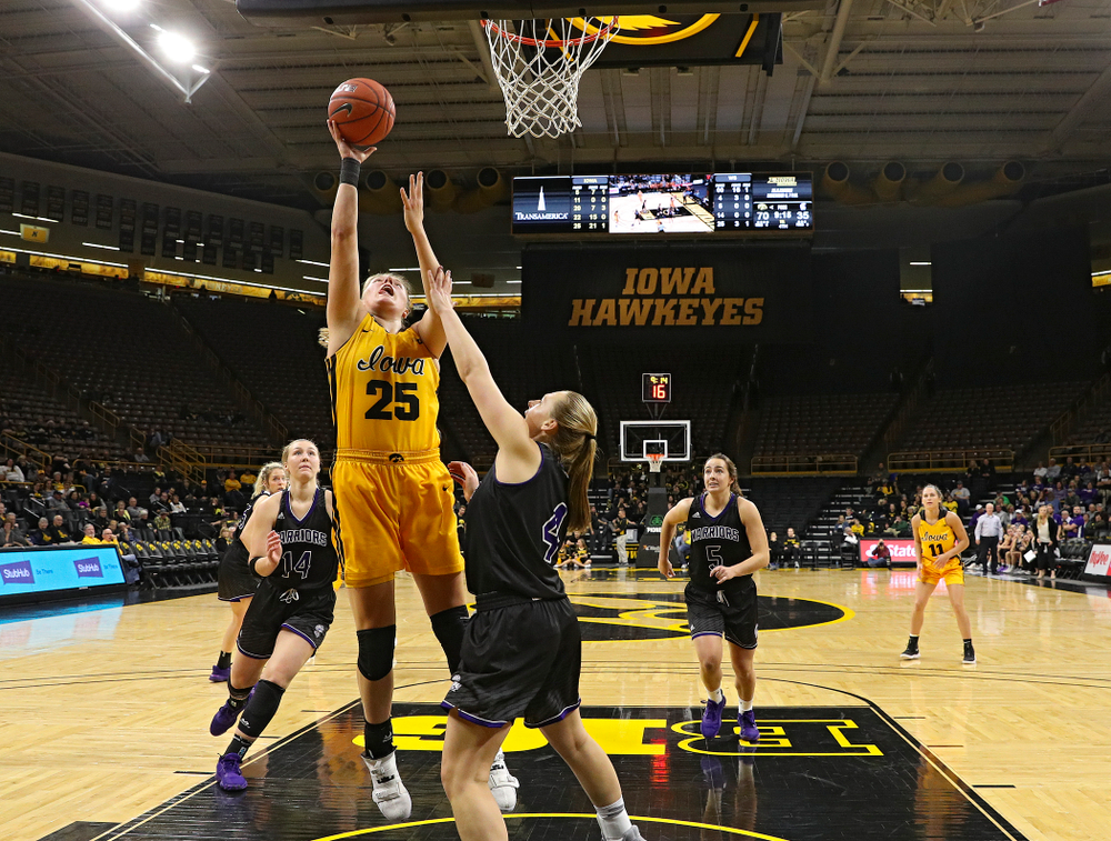 Iowa forward/center Monika Czinano (25) makes a basket during the fourth quarter of their game against Winona State at Carver-Hawkeye Arena in Iowa City on Sunday, Nov 3, 2019. (Stephen Mally/hawkeyesports.com)