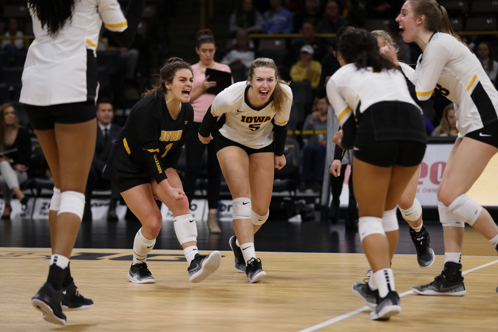 Iowa Hawkeyes defensive specialist Molly Kelly (1) and outside hitter Meghan Buzzerio (5) against the Ohio State Buckeyes Saturday, November 24, 2018 at Carver-Hawkeye Arena. (Brian Ray/hawkeyesports.com)