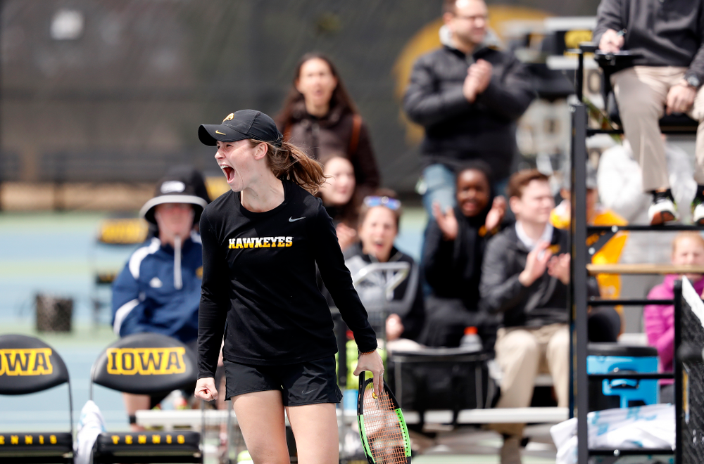 Elise Van Heuvelen and Anastasia Reimchen play a doubles match against the Wisconsin Badgers Sunday, April 22, 2018 at the Hawkeye Tennis and Recreation Center. (Brian Ray/hawkeyesports.com)