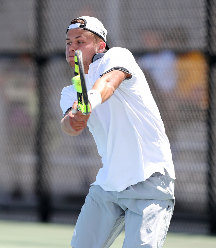 IowaÕs Will Davies against the Michigan Wolverines Sunday, April 21, 2019 at the Hawkeye Tennis and Recreation Complex. (Brian Ray/hawkeyesports.com)