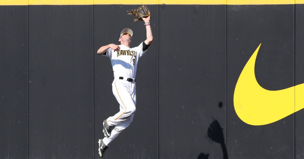 Iowa Hawkeyes outfielder Ben Norman (9) makes a catch in right field against the Nebraska Cornhuskers Saturday, April 20, 2019 at Duane Banks Field. (Brian Ray/hawkeyesports.com)