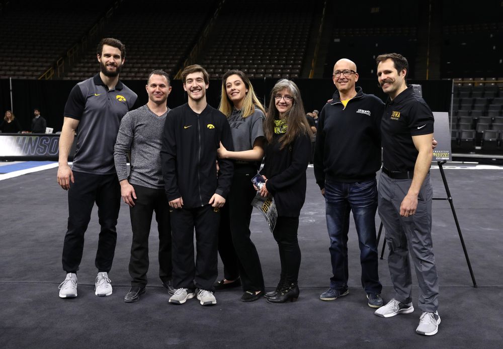 Iowa Men's Gymnast Kevin Johnson and his family during senior day ceremonies following their meet against the Ohio State Buckeyes Saturday, March 16, 2019 at Carver-Hawkeye Arena. (Brian Ray/hawkeyesports.com)