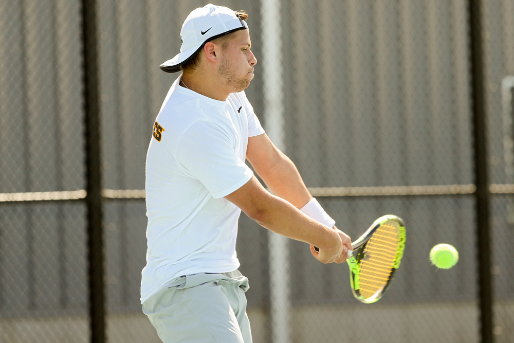 Iowa's Will Davies during his match against Michigan at the Hawkeye Tennis and Recreation Complex in Iowa City on Sunday, Apr. 21, 2019. (Stephen Mally/hawkeyesports.com)