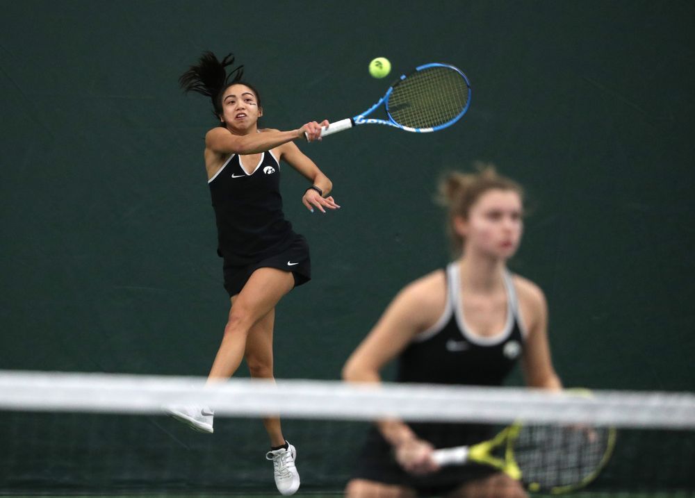 Iowa's Michelle Bacalla and Cloe Ruettte play a doubles match against the Penn State Nittany Lions Sunday, February 24, 2019 at the Hawkeye Tennis and Recreation Complex. (Brian Ray/hawkeyesports.com)