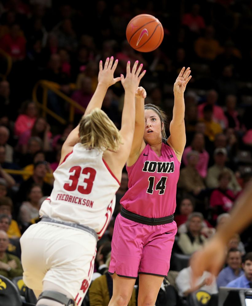 Iowa Hawkeyes forward McKenna Warnock (14) against the Wisconsin Badgers Sunday, February 16, 2020 at Carver-Hawkeye Arena. (Brian Ray/hawkeyesports.com)