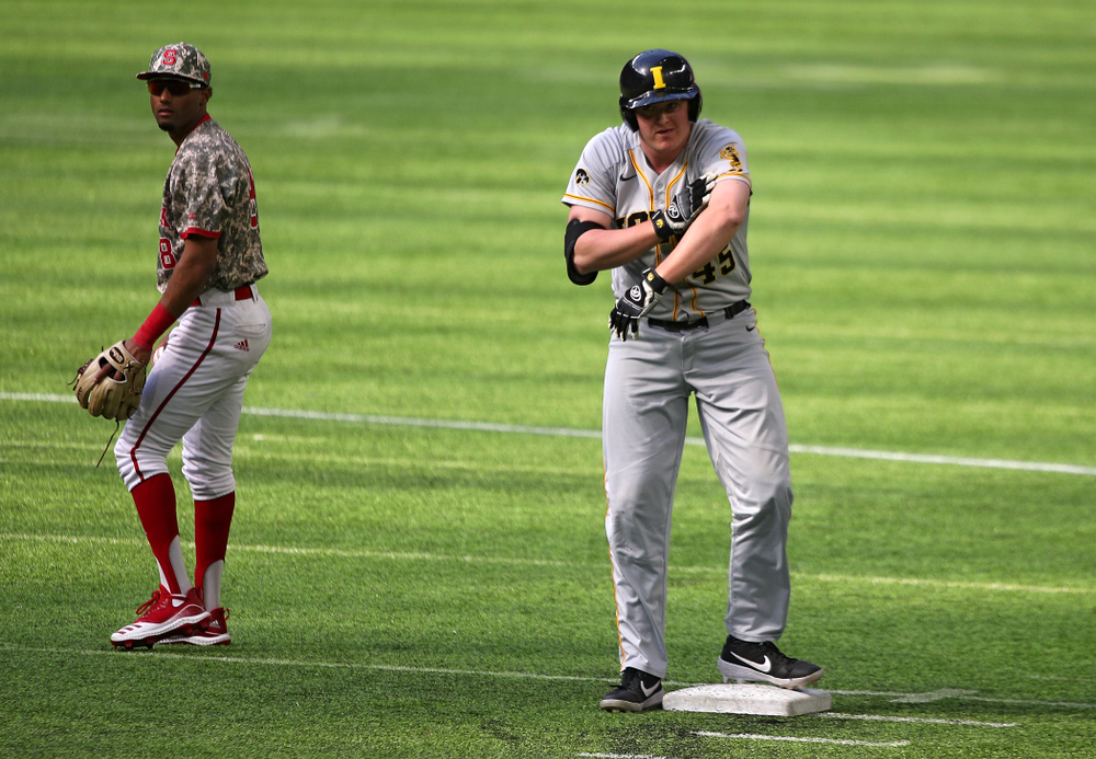 Iowa Hawkeyes first baseman Peyton Williams (45) celebrates after hitting a double during the fifth inning of their CambriaCollegeClassic game at U.S. Bank Stadium in Minneapolis, Minn. on Friday, February 28, 2020. (Stephen Mally/hawkeyesports.com)