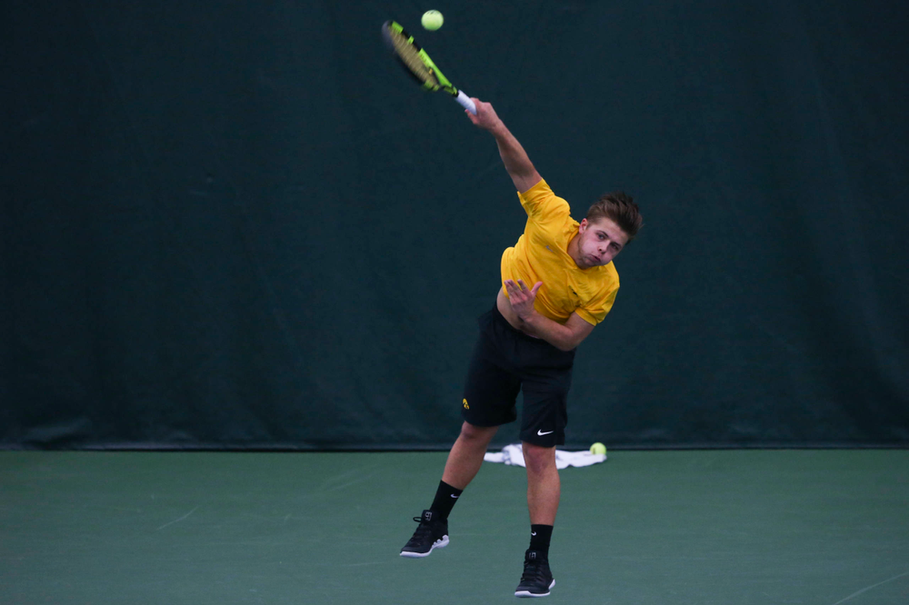 Iowa's Jonas Larsen at a tennis match vs Drake Friday, March 8, 2019 at the Hawkeye Tennis and Recreation Complex. (Lily Smith/hawkeyesports.com)