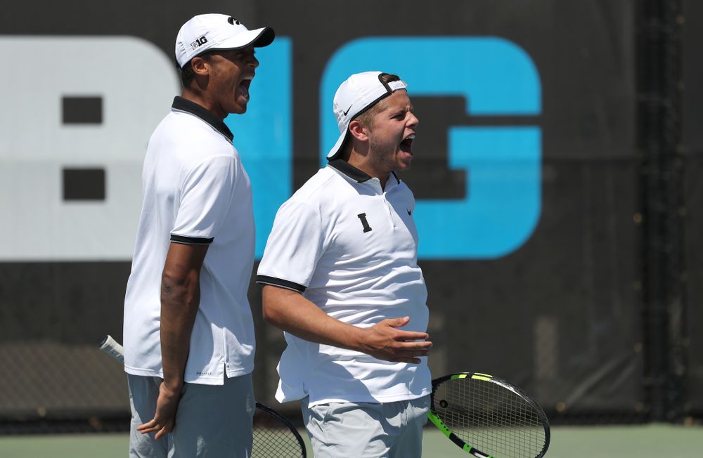 IowaÕs Oliver Okonkwo and Will Davies play a doubles match against the Michigan Wolverines Sunday, April 21, 2019 at the Hawkeye Tennis and Recreation Complex. (Brian Ray/hawkeyesports.com)