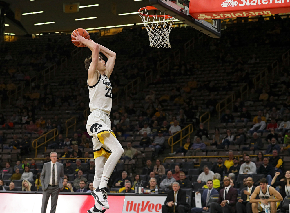 Iowa Hawkeyes forward Patrick McCaffery (22) dunks the ball during the second half of their exhibition game against Lindsey Wilson College at Carver-Hawkeye Arena in Iowa City on Monday, Nov 4, 2019. (Stephen Mally/hawkeyesports.com)