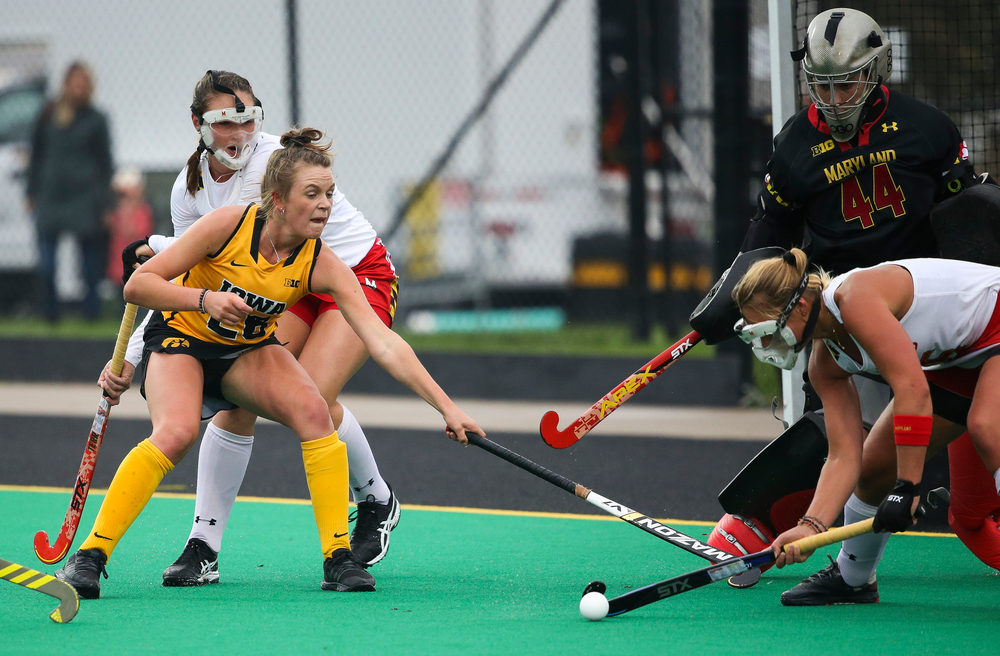Iowa Hawkeyes forward Madeleine Murphy (26) fights for a rebound on a penalty corner during a game against Maryland at Grant Field on October 14, 2018. (Tork Mason/hawkeyesports.com)