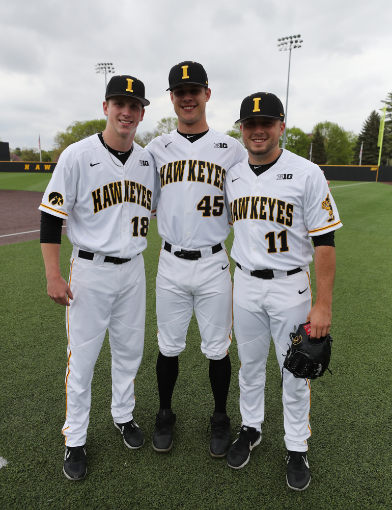 Iowa Hawkeyes Shane Ritter (18), Kyle Shimp (45), and Cole McDonald (11) before their game against Michigan State Sunday, May 12, 2019 at Duane Banks Field. (Brian Ray/hawkeyesports.com)