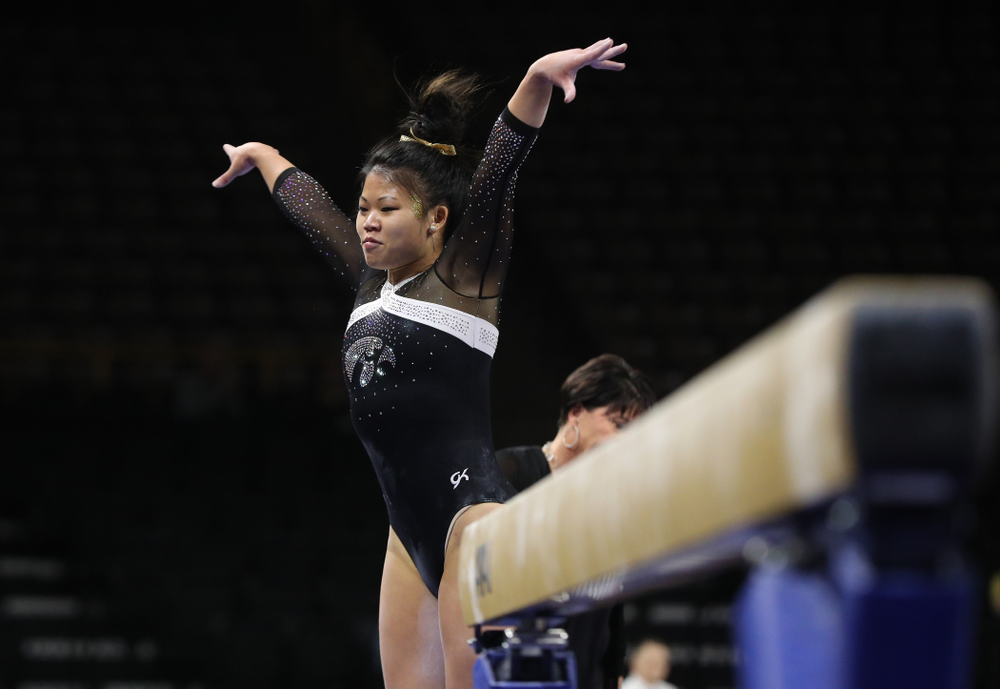Iowa's Misty-Jade Carlson competes on the beam against the Rutgers Scarlet Knights Saturday, January 26, 2019 at Carver-Hawkeye Arena. (Brian Ray/hawkeyesports.com)