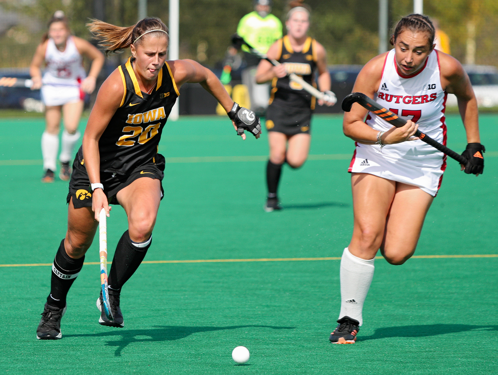 Iowa’s Sophie Sunderland (20) sprints with the ball during the second quarter of their match at Grant Field in Iowa City on Friday, Oct 4, 2019. (Stephen Mally/hawkeyesports.com)