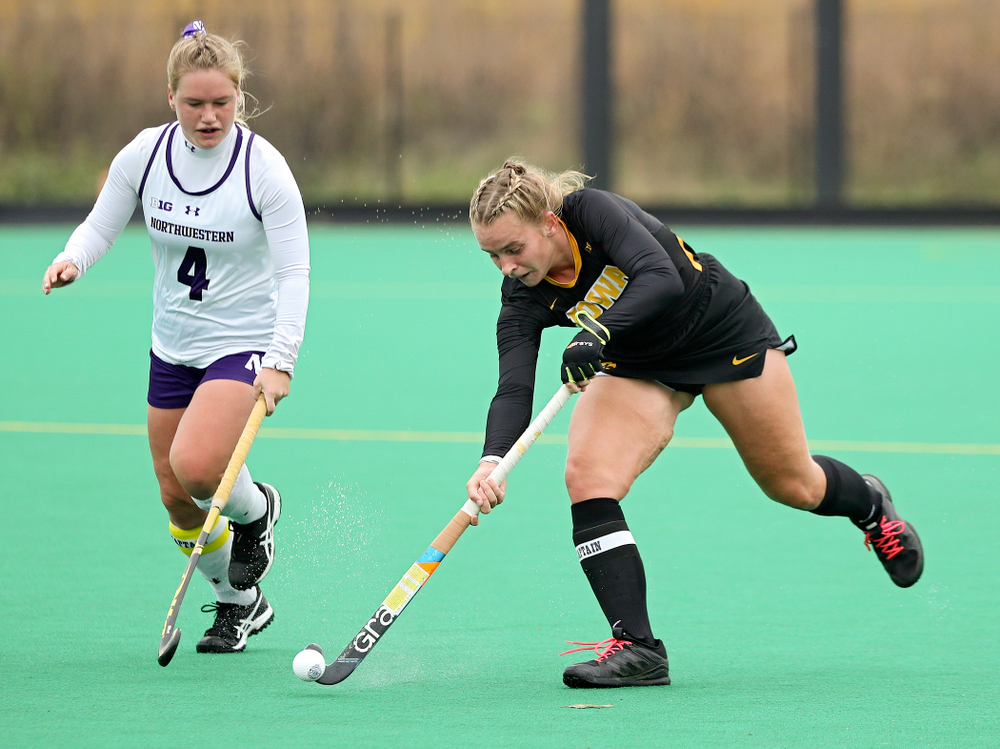 Iowa’s Katie Birch (11) passes during the second quarter of their game at Grant Field in Iowa City on Saturday, Oct 26, 2019. (Stephen Mally/hawkeyesports.com)