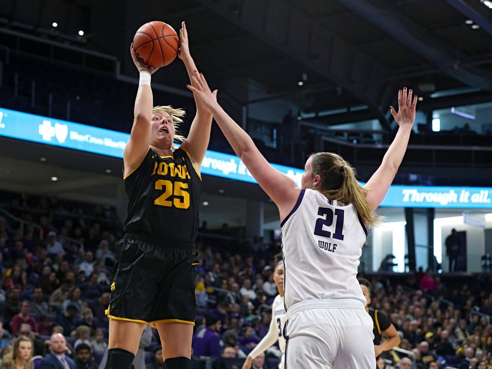 Iowa Hawkeyes forward Monika Czinano (25) makes a basket during the second quarter of their game at Welsh-Ryan Arena in Evanston, Ill. on Sunday, January 5, 2020. (Stephen Mally/hawkeyesports.com)