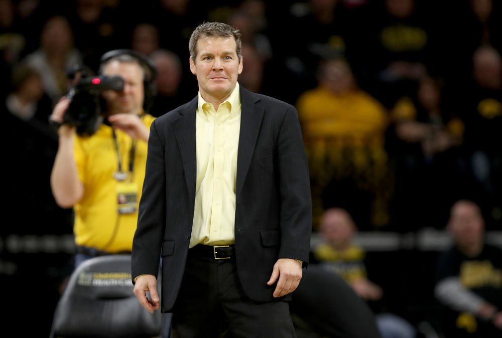 Head Coach Tom Brands works the edge of the mat as Iowa’s Michael Kemerer wrestles Ohio State’s Kaleb Romero at 174 pounds Friday, January 24, 2020 at Carver-Hawkeye Arena. Kemerer won the match 7-1. (Brian Ray/hawkeyesports.com)