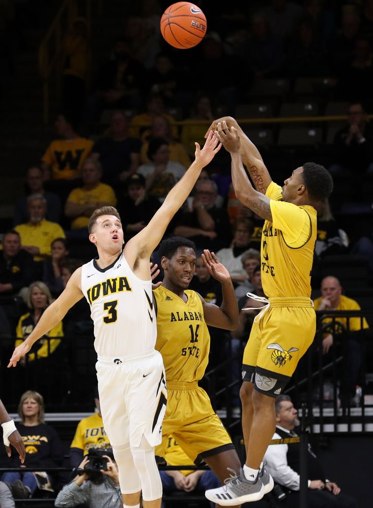 Iowa Hawkeyes guard Jordan Bohannon (3) contests a shot during a game against Alabama State at Carver-Hawkeye Arena on November 21, 2018. (Tork Mason/hawkeyesports.com)