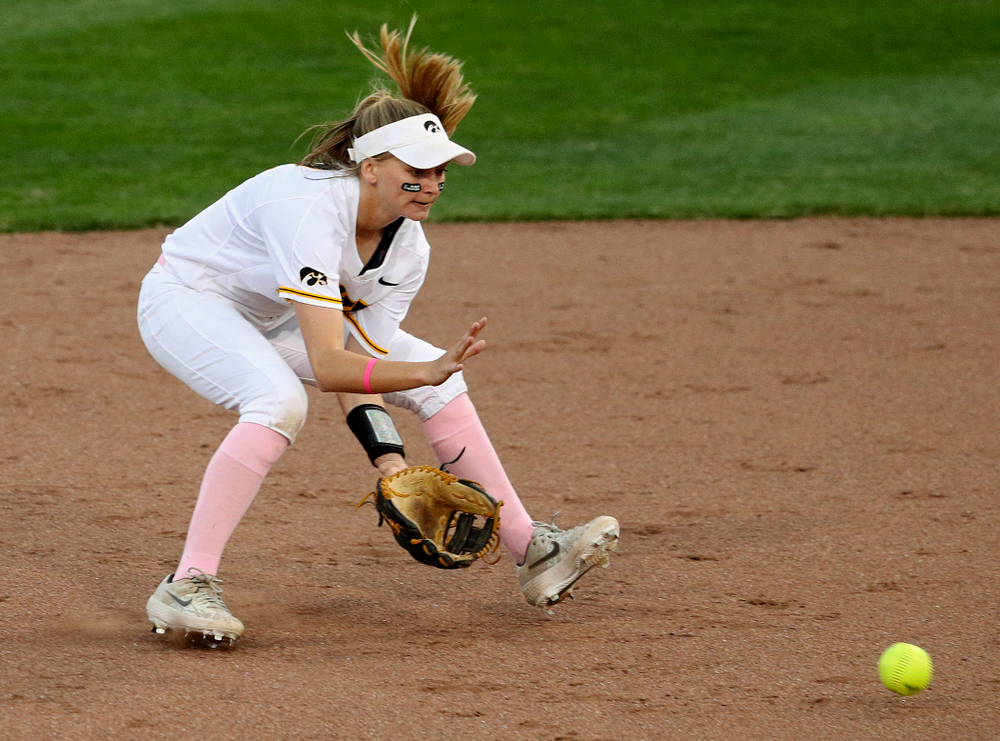 Iowa second baseman Aralee Bogar (2) fields a ground ball before throwing to first for an out during the third inning of their game against Iowa State at Pearl Field in Iowa City on Tuesday, Apr. 9, 2019. (Stephen Mally/hawkeyesports.com)