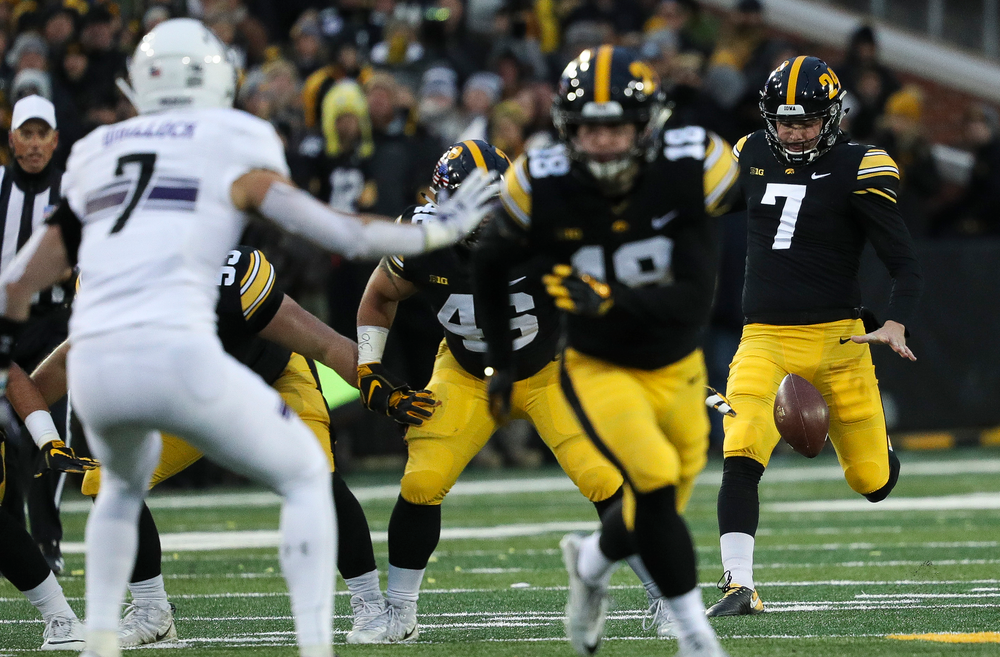 Iowa Hawkeyes punter Colten Rastetter (7) punts the ball during a game against Northwestern at Kinnick Stadium on November 10, 2018. (Tork Mason/hawkeyesports.com)