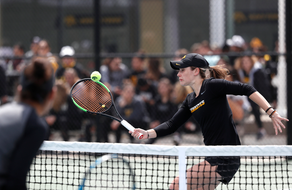 Elise Van Heuvelen and Anastasia Reimchen play a doubles match against the Wisconsin Badgers Sunday, April 22, 2018 at the Hawkeye Tennis and Recreation Center. (Brian Ray/hawkeyesports.com)