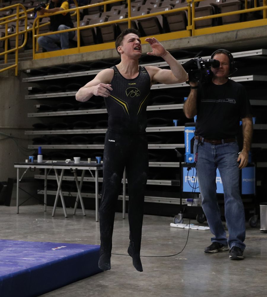 Iowa's Jake Brodarzon cheers on his teammates during their meet against the Ohio State Buckeyes Saturday, March 16, 2019 at Carver-Hawkeye Arena. (Brian Ray/hawkeyesports.com)