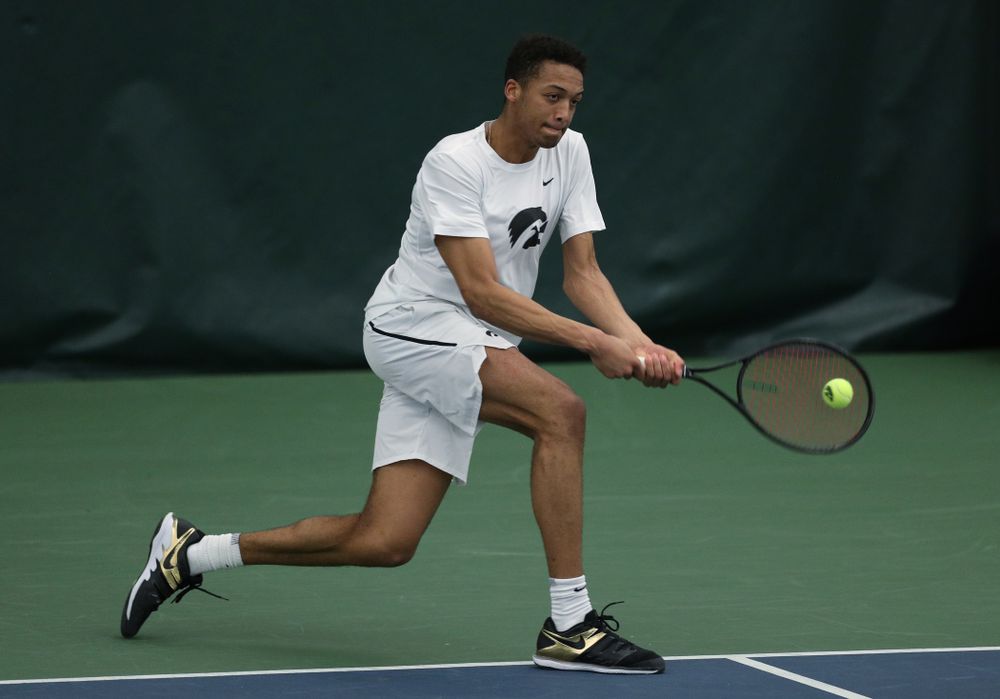 Iowa’s Oliver Okonkwo against Cornell Sunday, March 8, 2020 at the Hawkeye Tennis and Recreation Center. (Brian Ray/hawkeyesports.com)