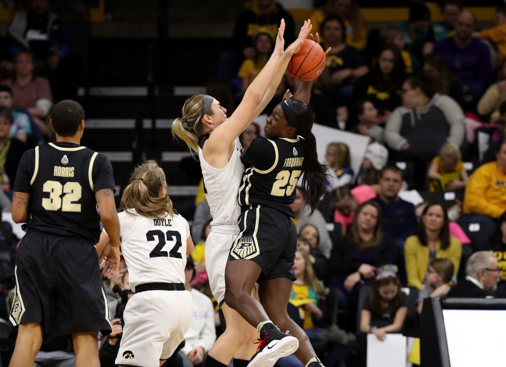 Iowa Hawkeyes forward Hannah Stewart (21) blocks a shot against the Purdue Boilermakers Sunday, January 27, 2019 at Carver-Hawkeye Arena. (Brian Ray/hawkeyesports.com)