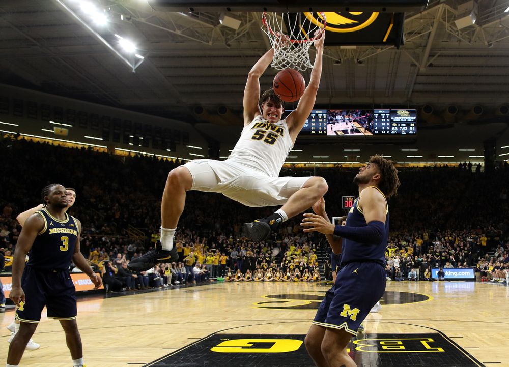Iowa Hawkeyes forward Luka Garza (55) dunks the ball against the Michigan Wolverines Friday, February 1, 2019 at Carver-Hawkeye Arena. (Brian Ray/hawkeyesports.com)