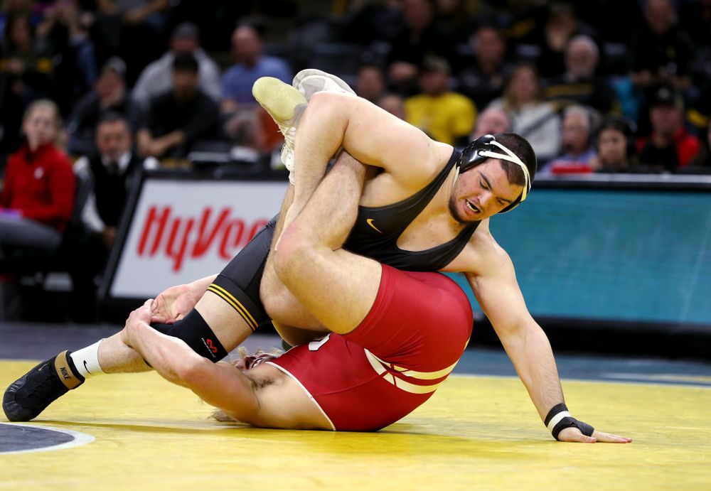 IowaÕs Tony Cassioppi wrestles WisconsinÕs Trent Hillger at heavyweight Sunday, December 1, 2019 at Carver-Hawkeye Arena. Cassioppi won the match 3-2. (Brian Ray/hawkeyesports.com)